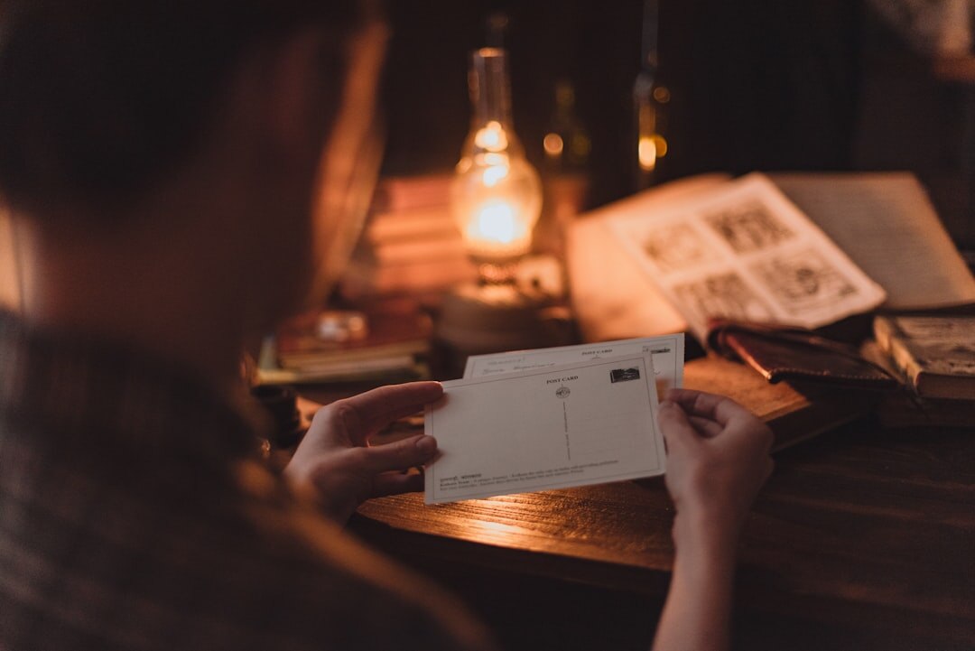 person reading old letters